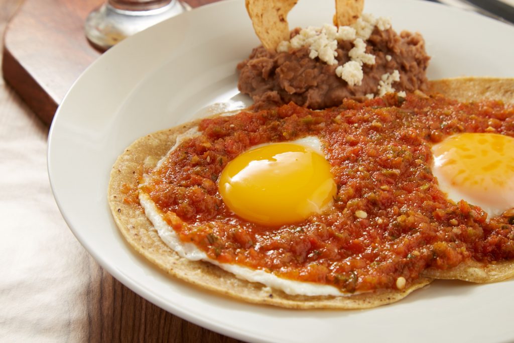 Photo of plate with huevos rancheros illustrates blog: "Are Huevos Rancheros Authentic Mexican Food?"