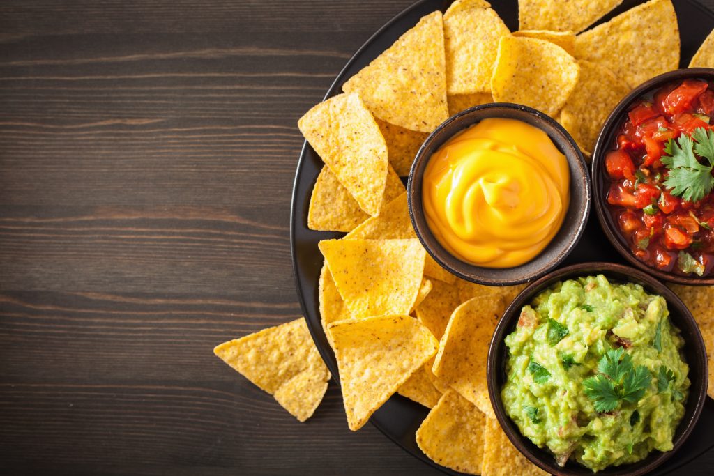 Closeup of nachos illustrates blog "Are Nachos a Salad?"