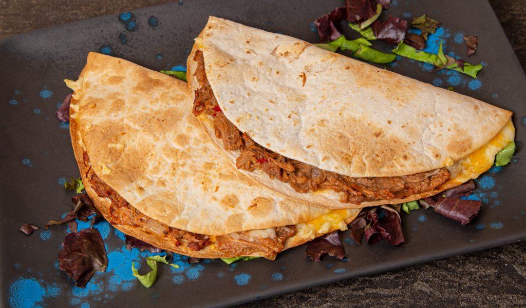 Plate of quesadillas illustrates blog: "3 Ideas to Take Your Quesadillas to the Next Level"